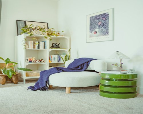 A well organized cozy corner in a living room